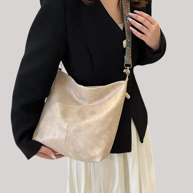 Embjørg | Klassisk axelväska med justerbart mönstrat band