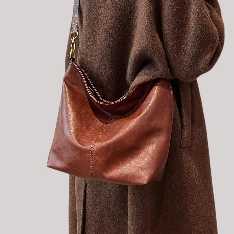 Embjørg | Klassisk axelväska med justerbart mönstrat band